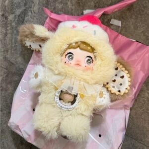 Nommi a bite of sweetheart - clouds are tuckled